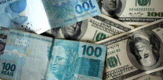 “superquarta”:-dolar-abre-em-baixa,-a-espera-dos-juros-no-brasil-e-eua