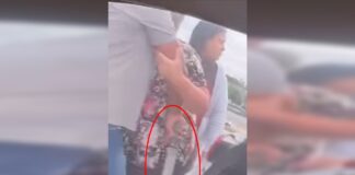 homem-e-contido-por-mulher-ao-pegar-facao-em-briga-de-transito.-video