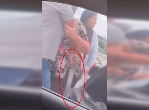 homem-e-contido-por-mulher-ao-pegar-facao-em-briga-de-transito.-video