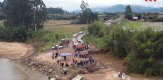chuvas-no-rs:-area-rural-faz-bolo-de-1-ano-sem-reconstrucao-de-ponte