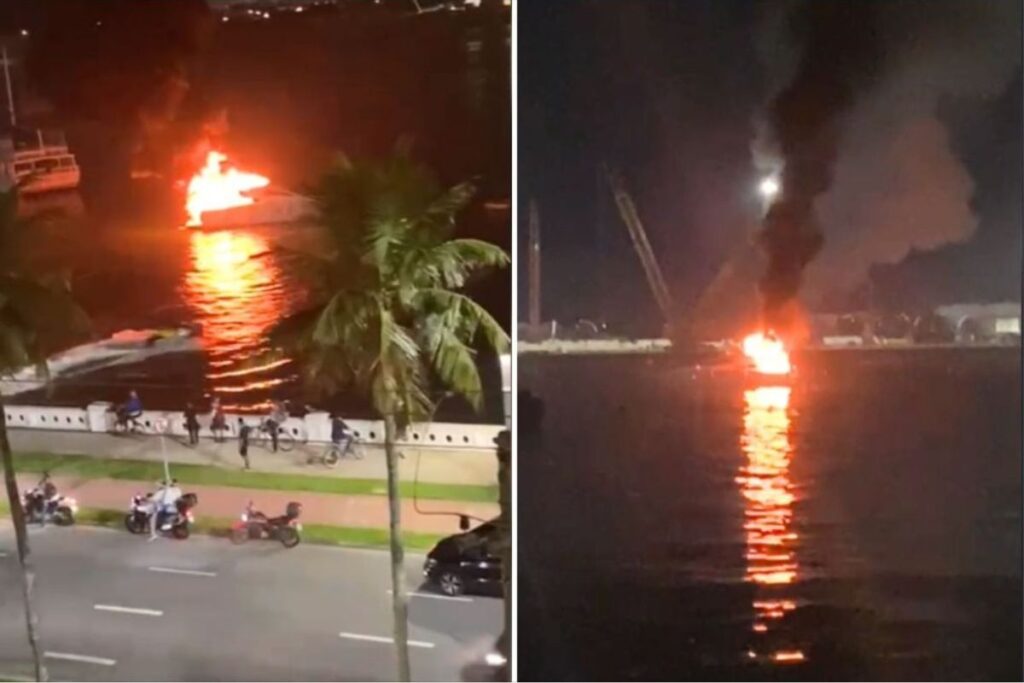 embarcacao-com-2-pessoas-pega-fogo-no-mar-de-santos,-litoral-de-sp