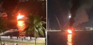 embarcacao-com-2-pessoas-pega-fogo-no-mar-de-santos,-litoral-de-sp