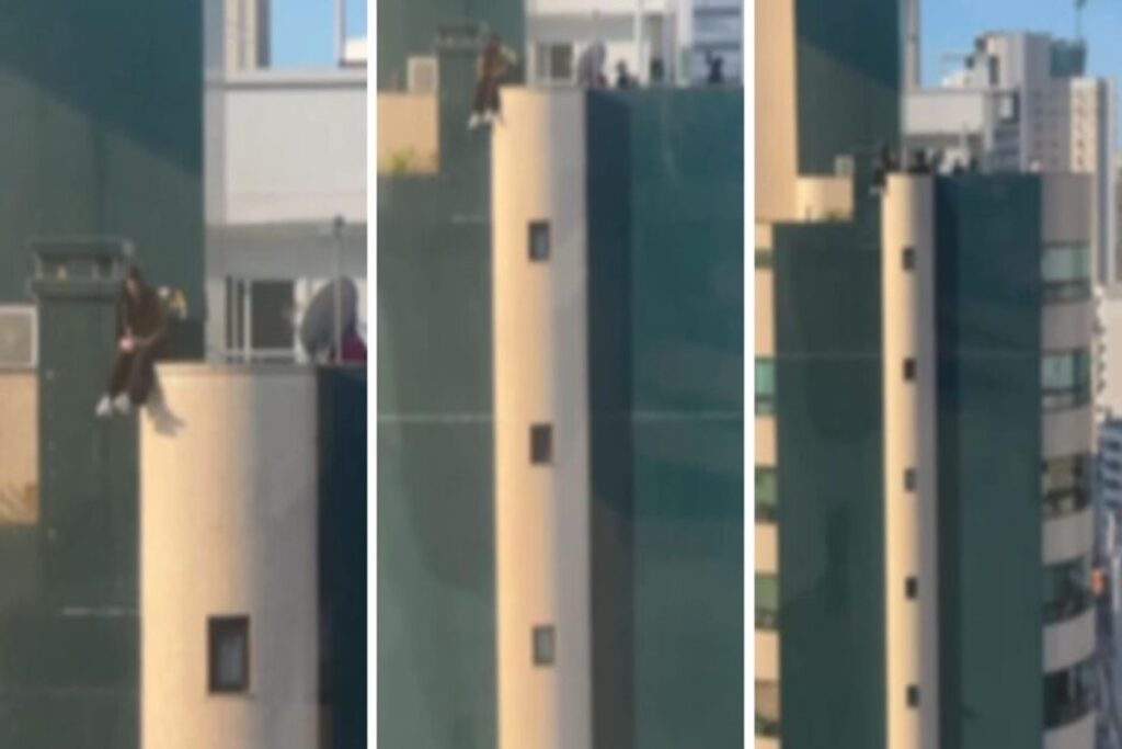 adolescente-arrisca-a-vida-sentada-em-topo-de-predio-em-sc.-video