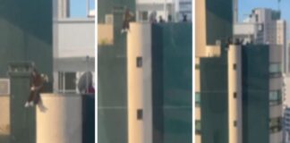adolescente-arrisca-a-vida-sentada-em-topo-de-predio-em-sc.-video
