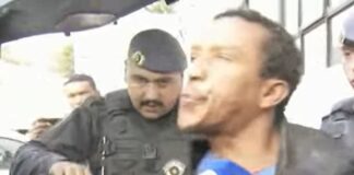 “galo-cego”-cuspiu-em-2-reporteres-ao-ser-preso-por-homicidio.-veja