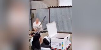 mulher-quebra-moto-da-sabesp-e-joga-pedra-contra-funcionario.-veja