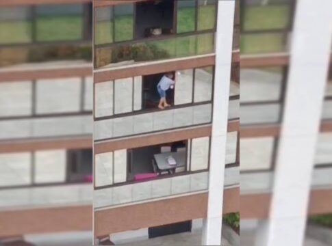 em-pe-na-janela:-mulher-arrisca-a-vida-ao-limpar-vidro-em-aguas-claras