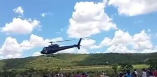 empresario-usa-helicoptero-para-jogar-carnes-sobre-cidade-em-goias