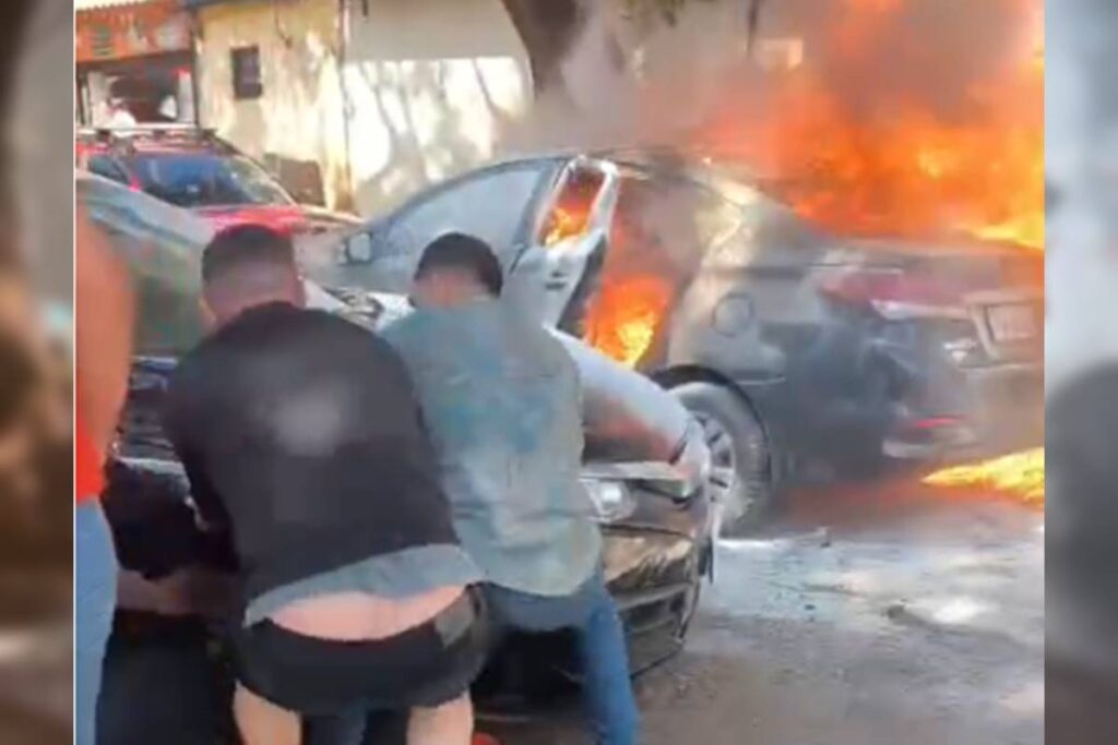populares-se-unem-e-salvam-carros-de-incendio-em-estacionamento.-veja-video