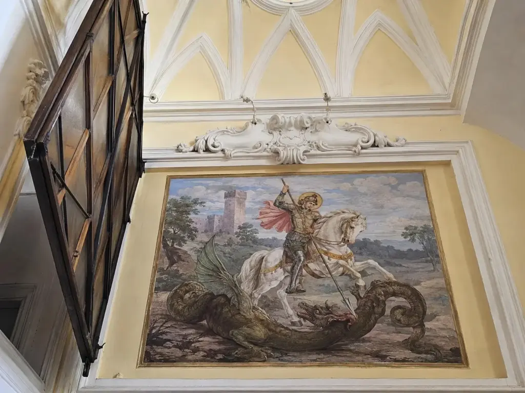 Restauradores removem uma grande pintura atrás do altar da igreja de San Giorgio Maggiore durante construção, e encontram outra obra escondida por séculos, com São Jorge enfrentando dragão preservado atrás da composição visível em uma das igrejas mais antigas da cidade